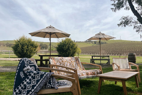 Lawn lounging. Couch setup on the lawn looking over the the vineyards.