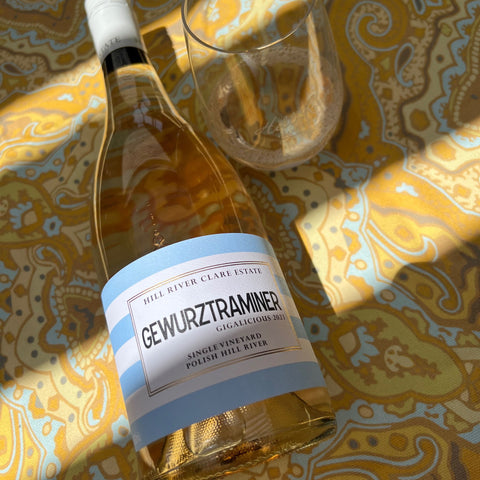 Hill River Clare Estate 2023 Gewurztraminer GIGalicious wine bottle on bright yellow and pastel blue picnic rug